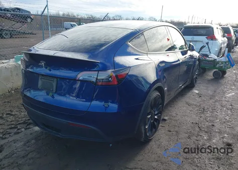 2023 Tesla Model Y Performance Dual Motor All-Wheel Drive z USA, uszkodzony, nr VIN 7SAYGDEFXPF905766